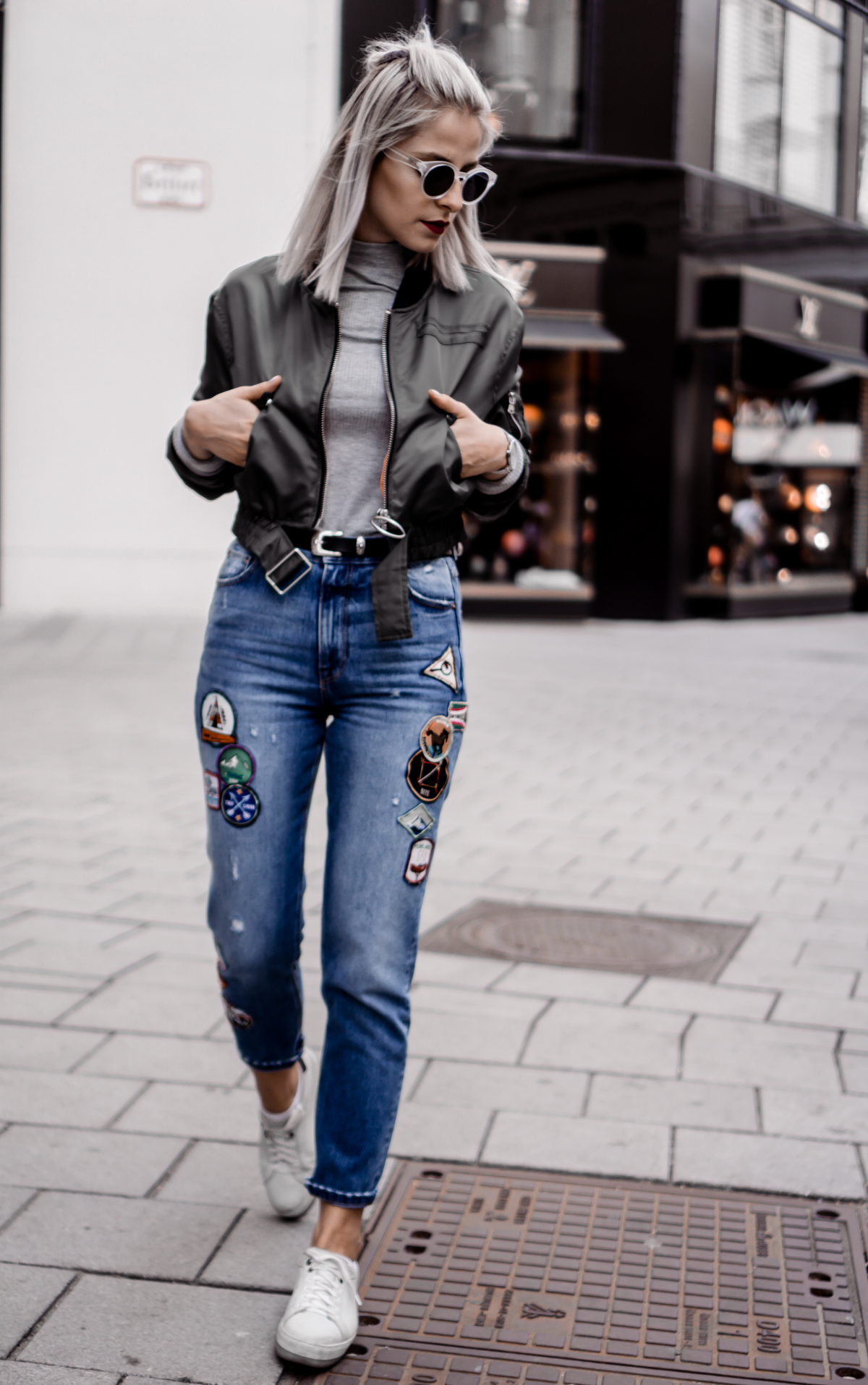 The Cosmopolitas Outfit: Mom Jeans and Bomber Jacket
