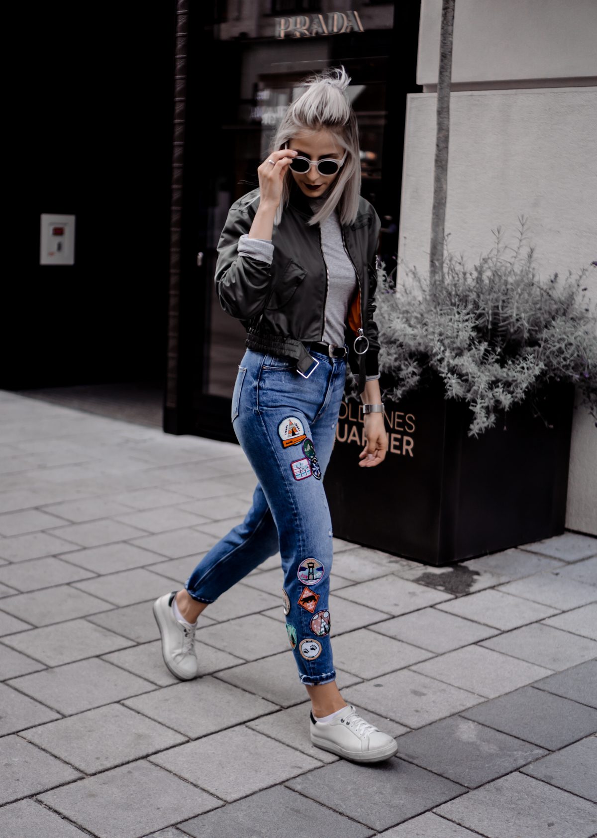The Cosmopolitas Outfit: Mom Jeans and Bomber Jacket